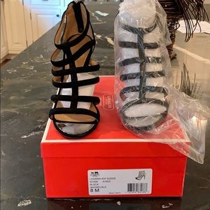 Brand new, never been worn Coach Sandal